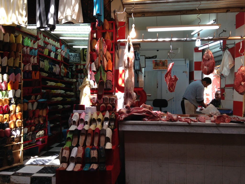 One-stop shopping: shoes and lamb sharing a display wall