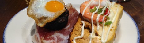 Pintxos in San Sebastian, Spain: Quail Egg on Blood Sausage, Shrimp on Salmon Loaf