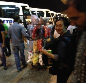 A pillow seller plies the bus station in Ankara, Turkey.