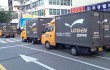 Trucks Await Deliveries From Alley-Bound Distributors in Seoul, South Korea